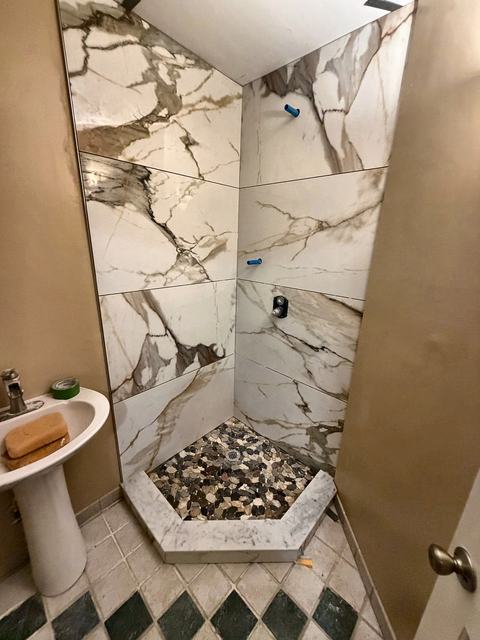 WoodHausWorks completed carpentry and tile project