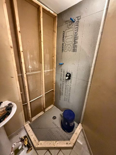WoodHausWorks completed carpentry and tile project