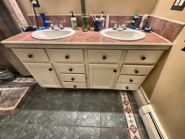 WoodHausWorks completed carpentry and tile project