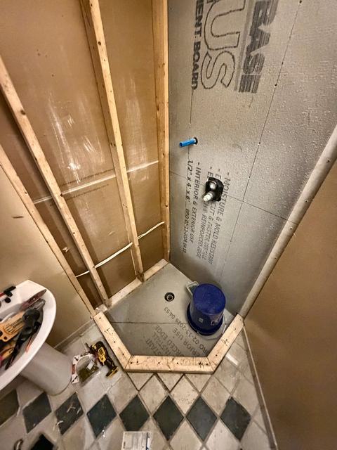 WoodHausWorks completed carpentry and tile project