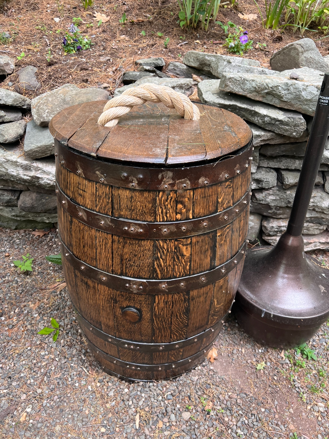 Zach Wood's handcrafted antique stained barrel with a rope-handled lid, the same piece that appeared in Variety