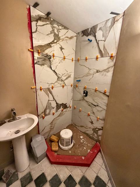 WoodHausWorks completed carpentry and tile project