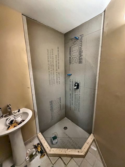 WoodHausWorks completed carpentry and tile project