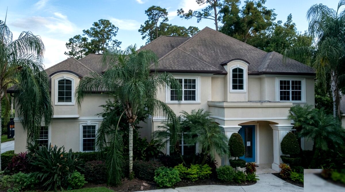 Before: Luxury home roof showing wear