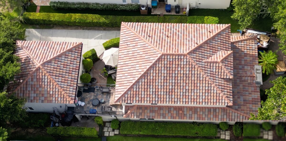 After: Aerial view with new tile roof