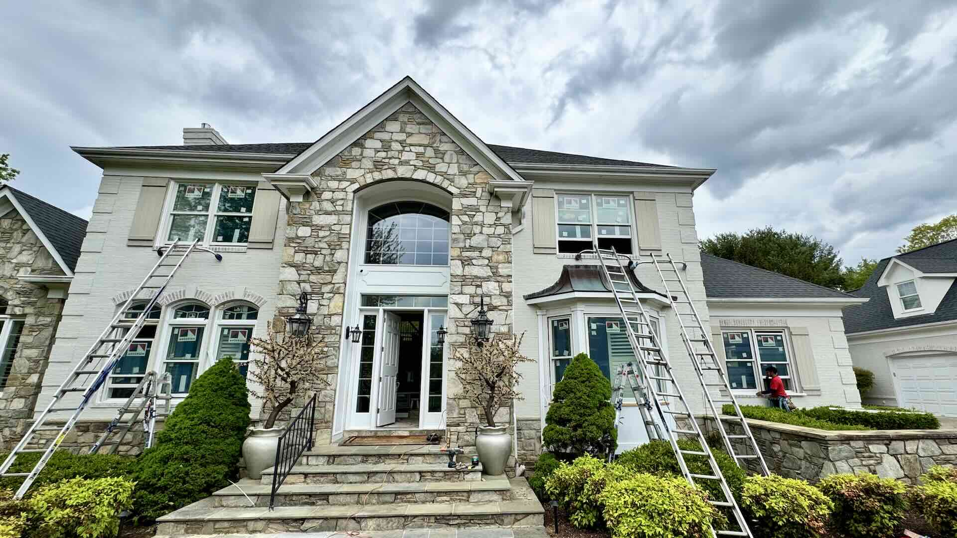 iRenovate Pro crew installing energy-efficient replacement windows in Frederick, MD.