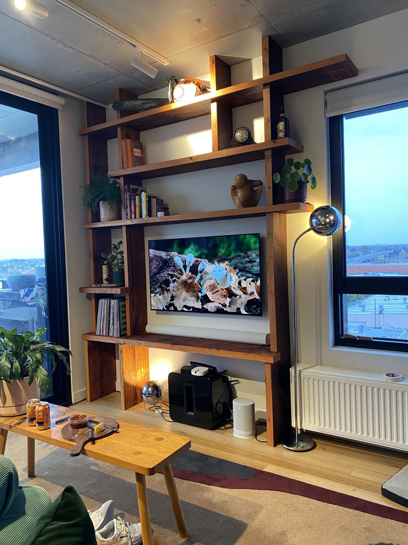 Custom timber shelving designed built and installed by Ian
