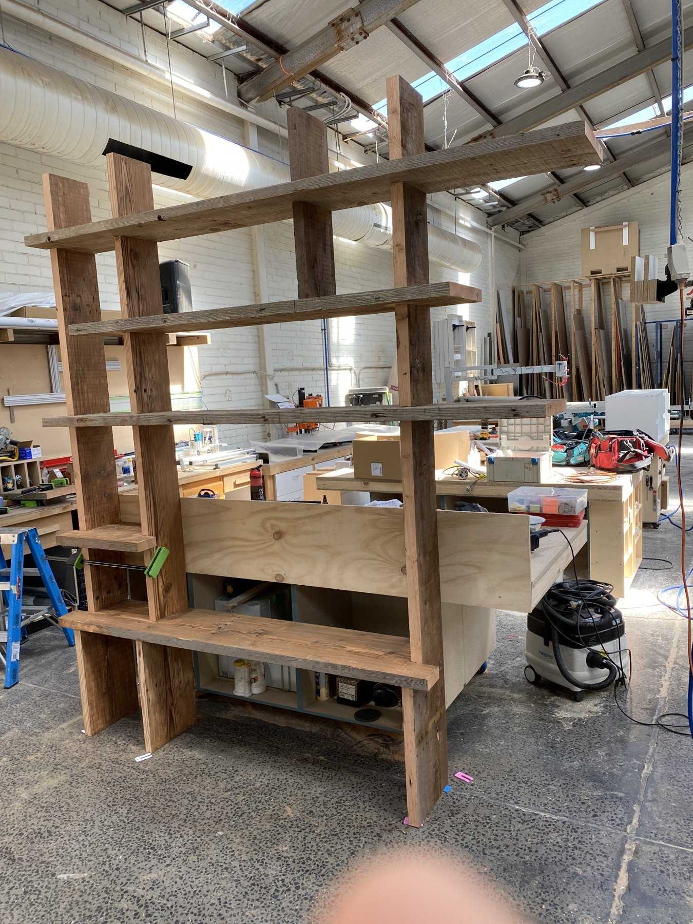 Timber shelving under construction in workshop