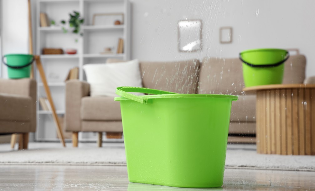 Buckets catching leaks that signal a plumbing system upgrade
