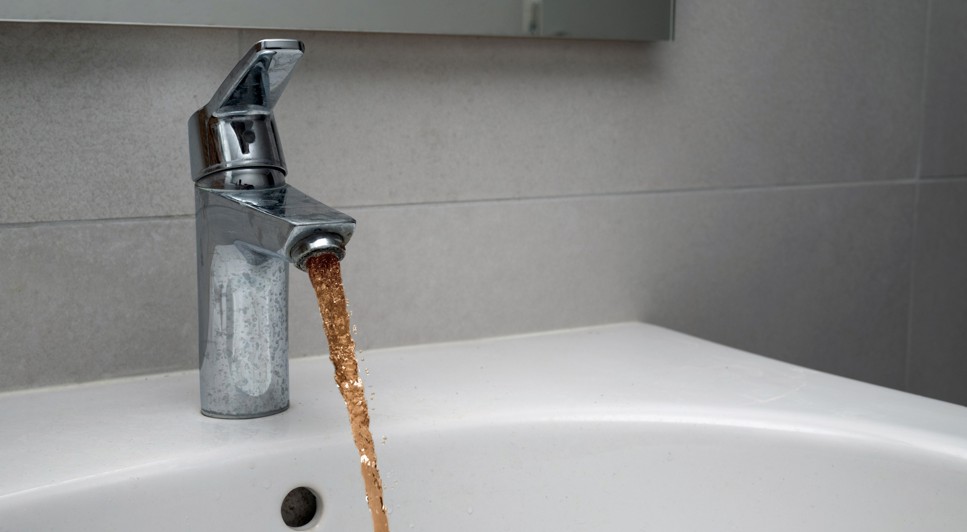 Discolored water signaling a plumbing system upgrade is needed