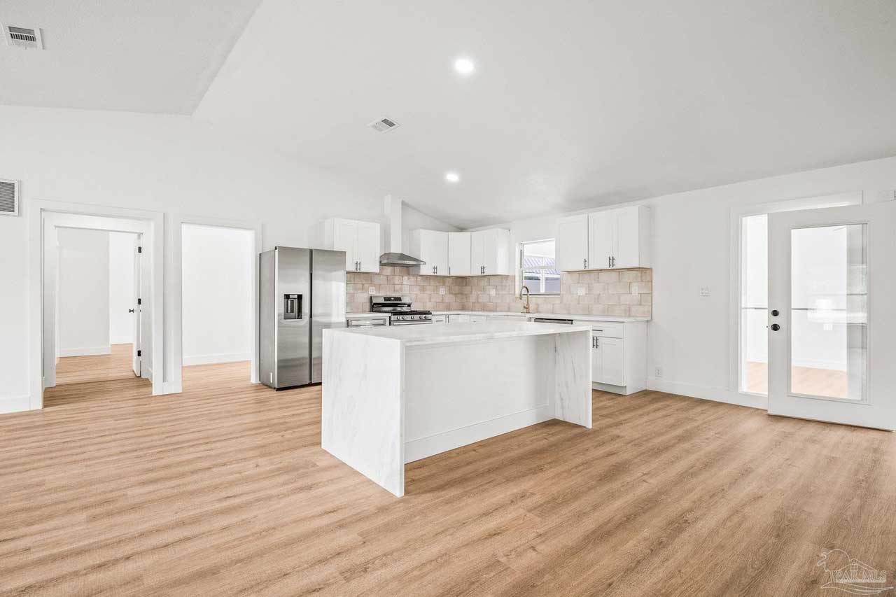 Kitchen and great room after renovation