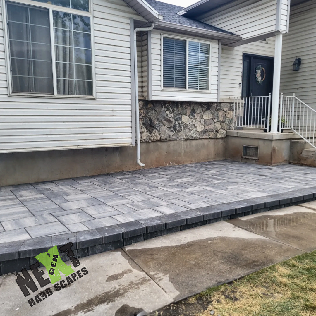 Head-on shot emphasizing the uniform height and alignment of the front pavers as well as the solid edge restraint block work. Head-on shot emphasizing the uniform height and alignment of the front pavers as well as the solid edge restraint block work.