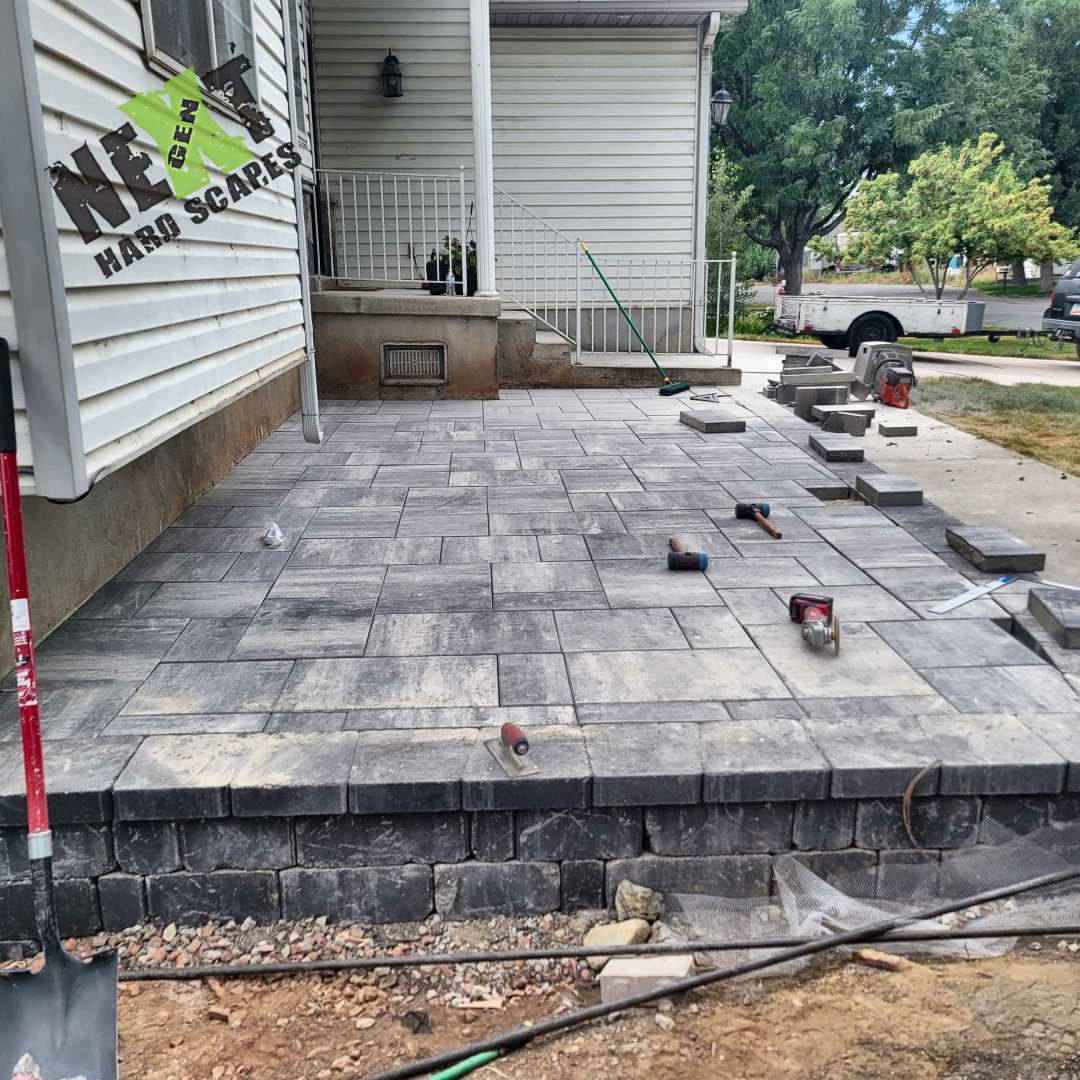 Nearly complete paver installation showing crisp, tight joints and a smooth surface ready for final finishing touches. Nearly complete paver installation showing crisp, tight joints and a smooth surface ready for final finishing touches.