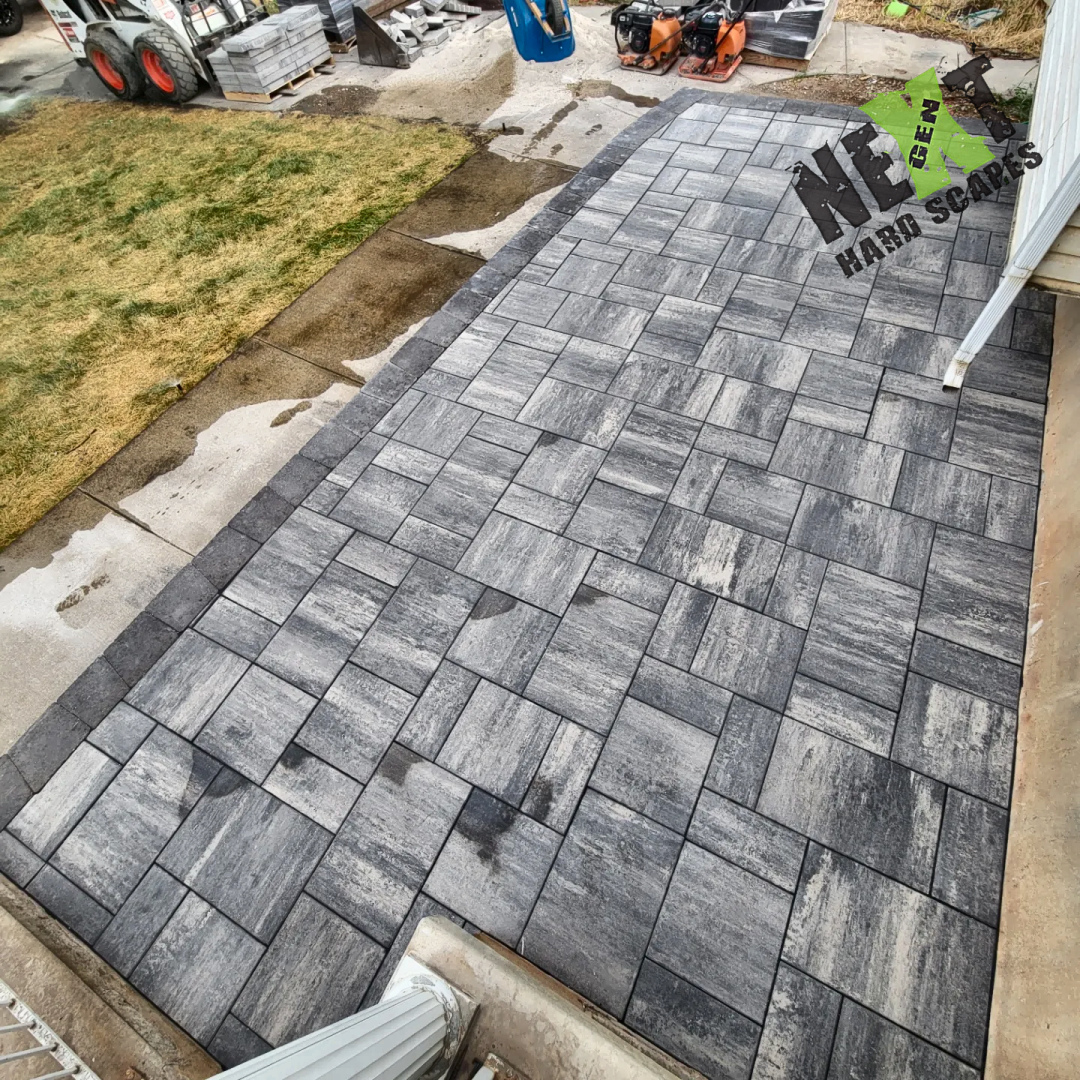 Perspective capturing the neat transition from the porch to the sidewalk with a consistent pattern and coloration. Perspective capturing the neat transition from the porch to the sidewalk with a consistent pattern and coloration.