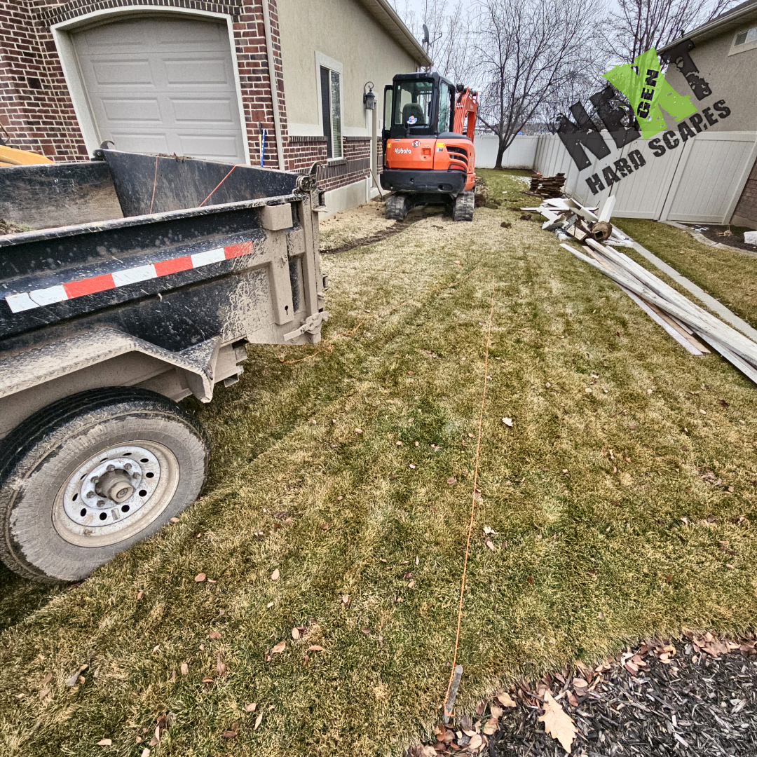 Base layout takes shape with initial soil staking and pre-excavation markers set along the RV pad’s future footprint.