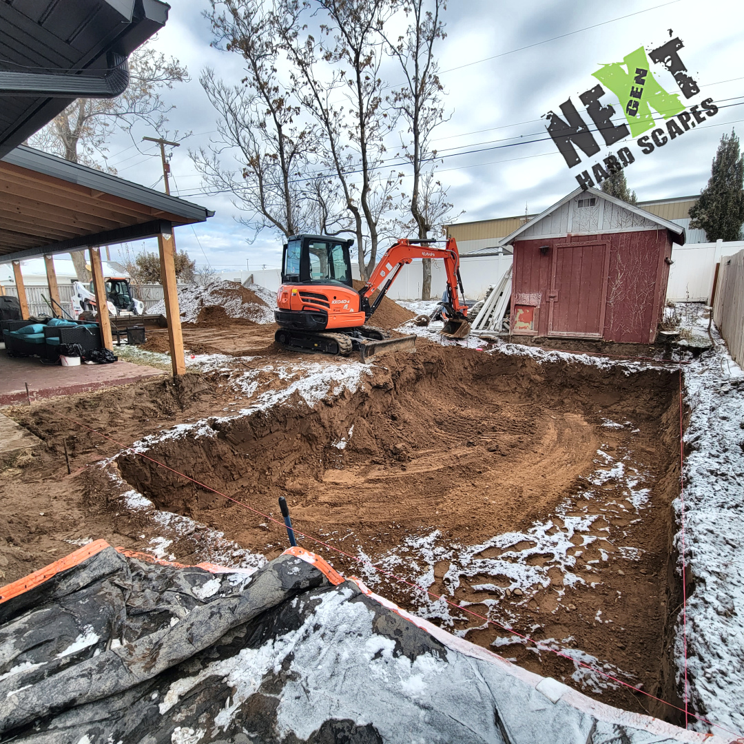 Excavation underway to create the hole for the swim spa, with soil removed and cleared. Excavation underway to create the hole for the swim spa, with soil removed and cleared.