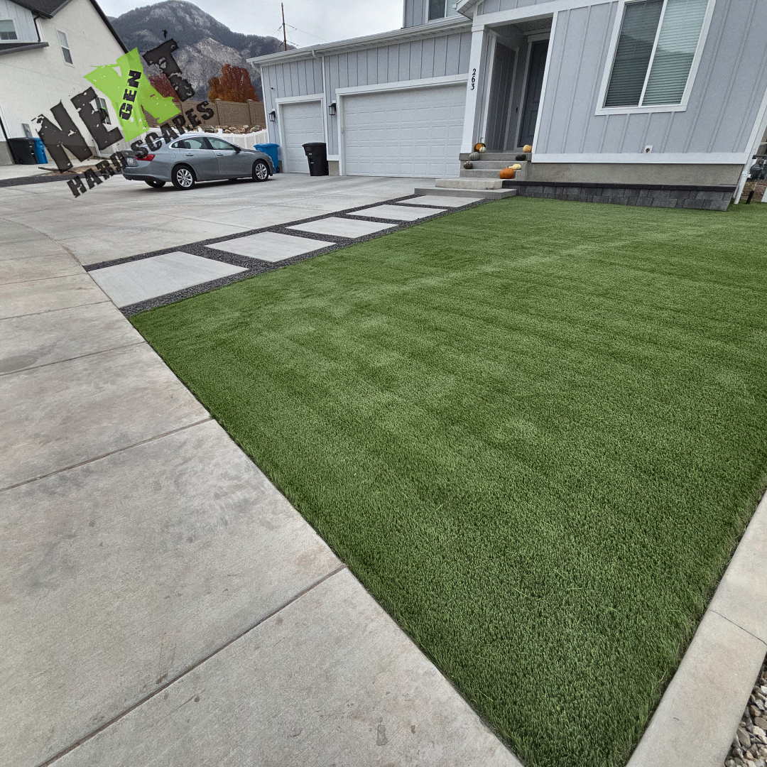 A view of the completed project from the yard side and the new driveway extension on the far side. 