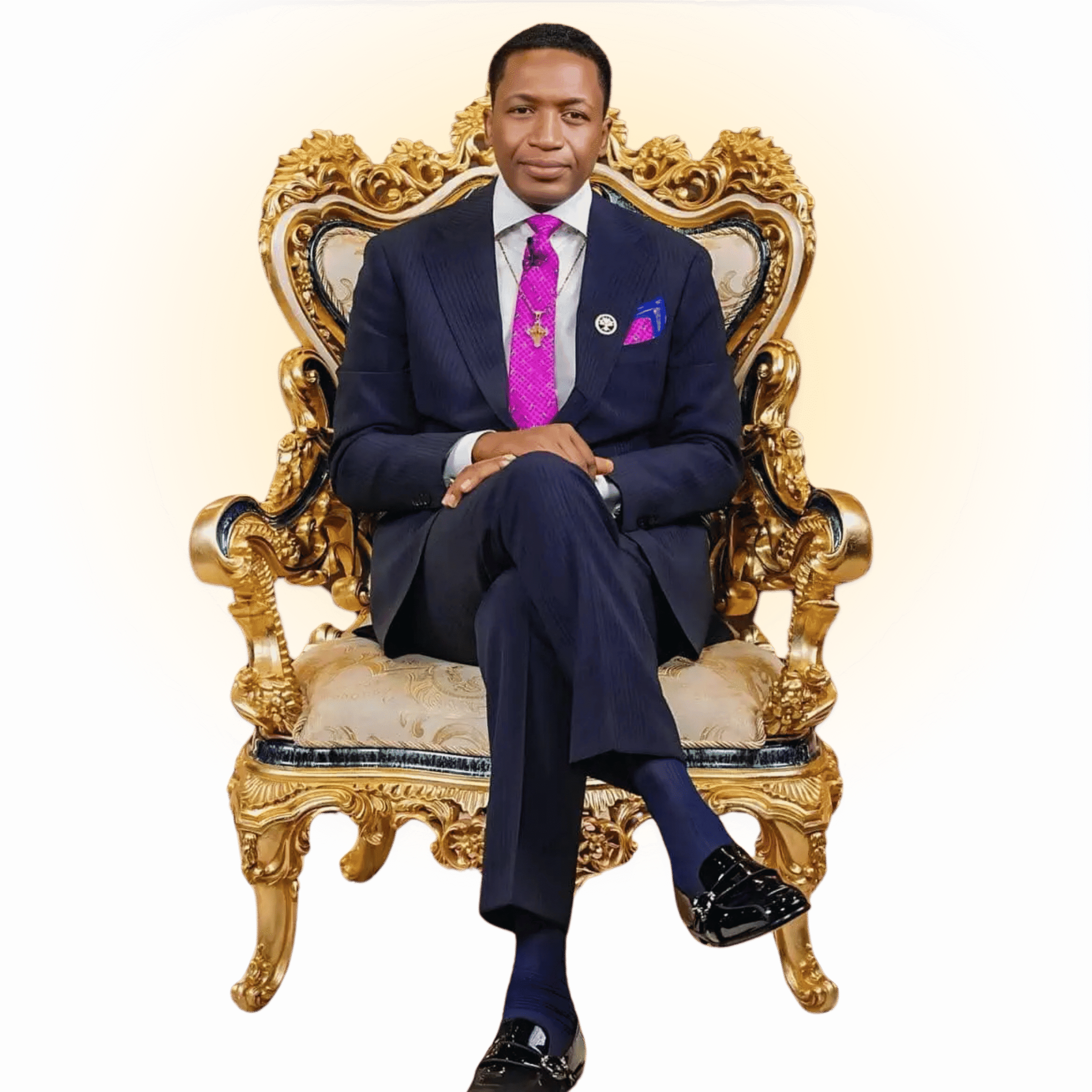 Prophet Uebert Angel seated on an ornate gold chair