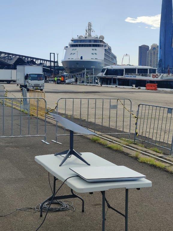 Satellite internet dish on a table at a cruise terminal