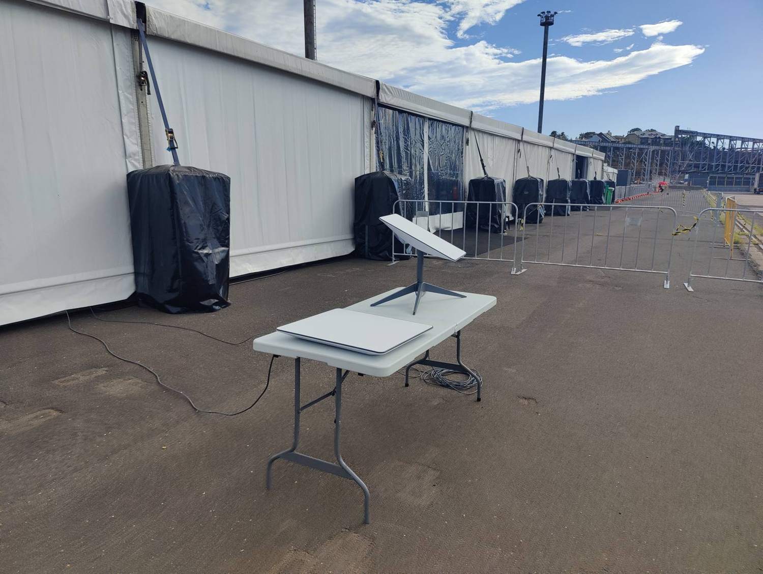 Satellite internet dish set up on a wharf for an event