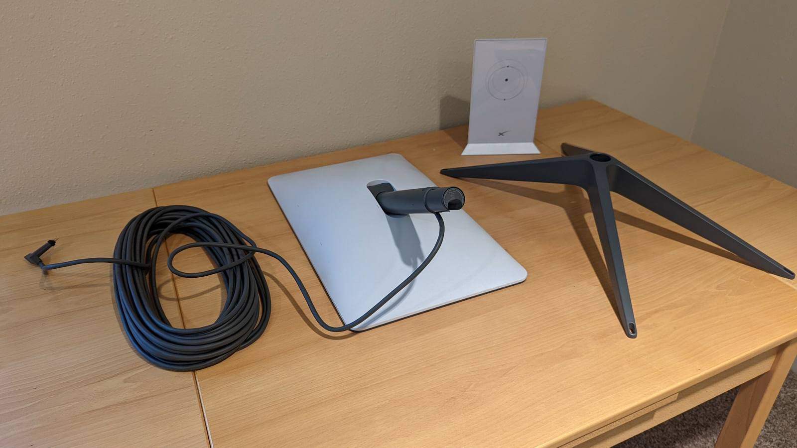 Standard actuated satellite internet kit set up on a desk