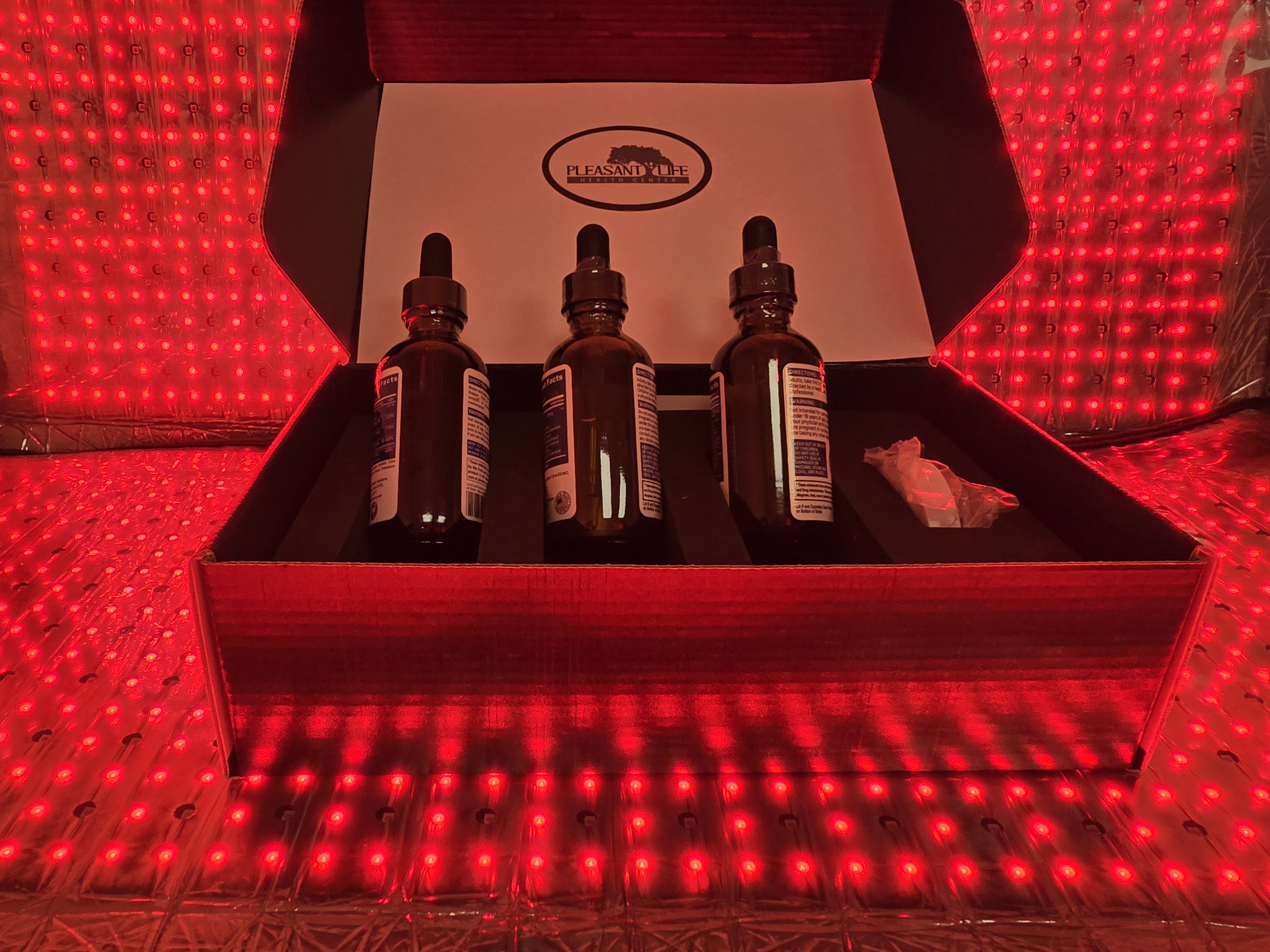 Calm wellness room with red-light panel