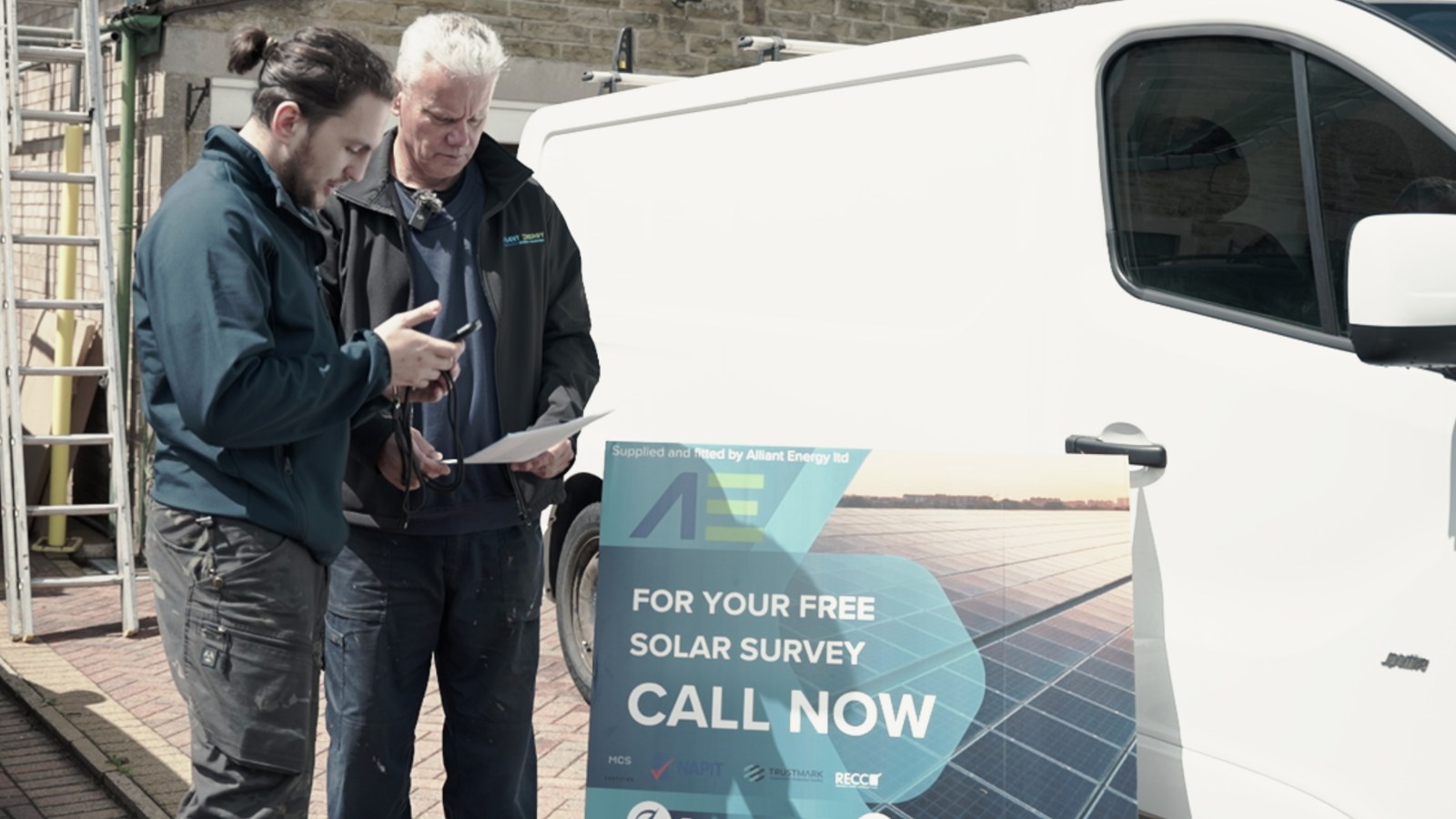 The Alliant Energy team on site with their branded van and survey board
