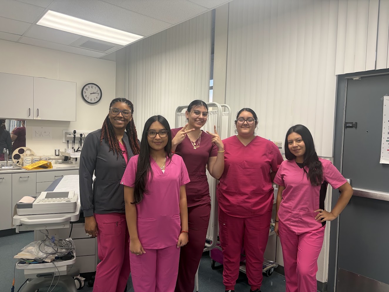 Medical Assistant Training in Pink Scrubs