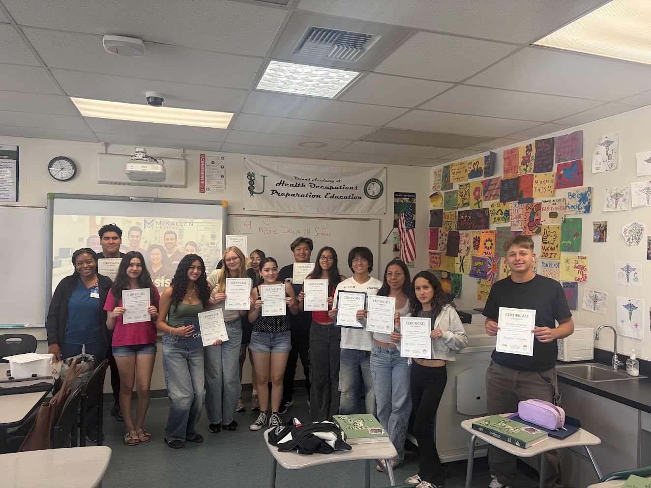 Students Presenting Certificates in Classroom