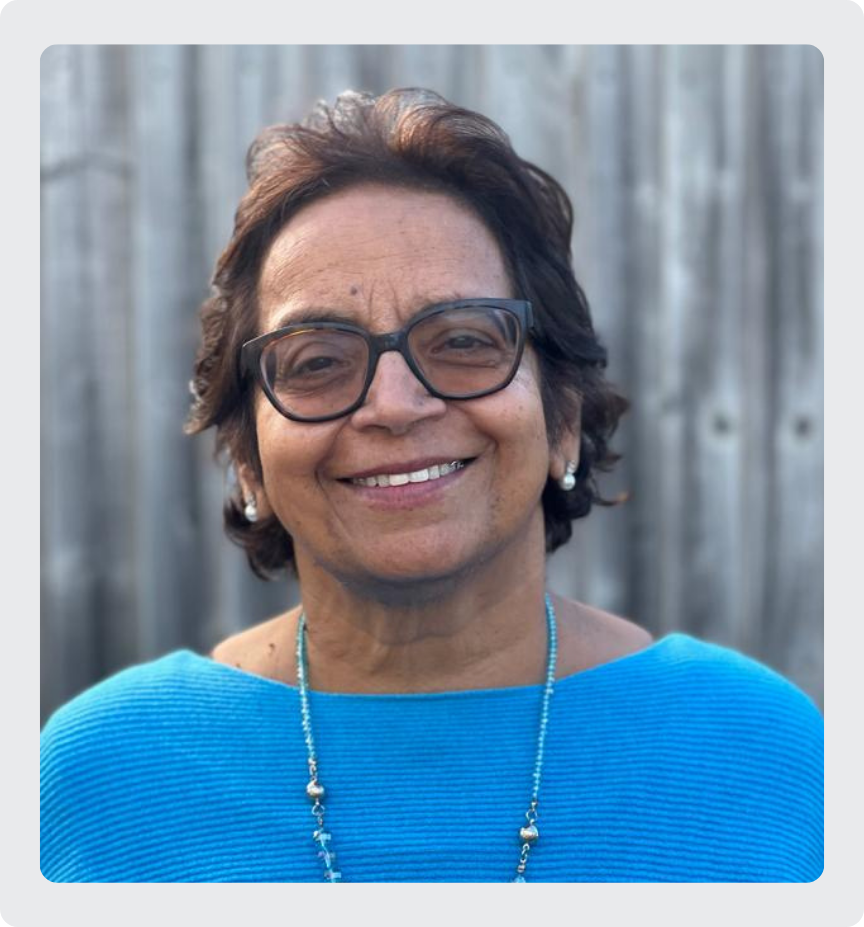 Grief Specialist Ghulam Fernandes smiling warmly