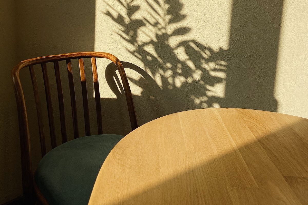 an empty chair at a table
