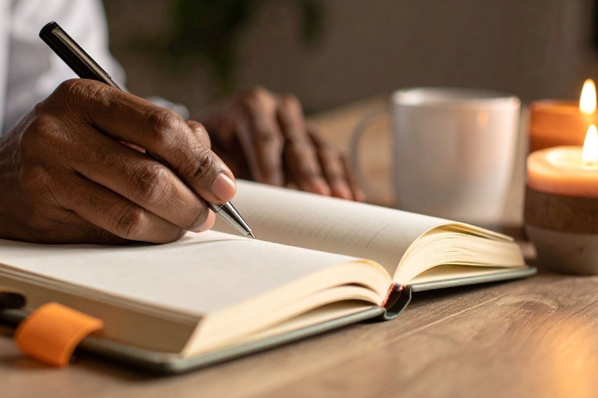 something with a touch more warmth/movement: hands, a journal