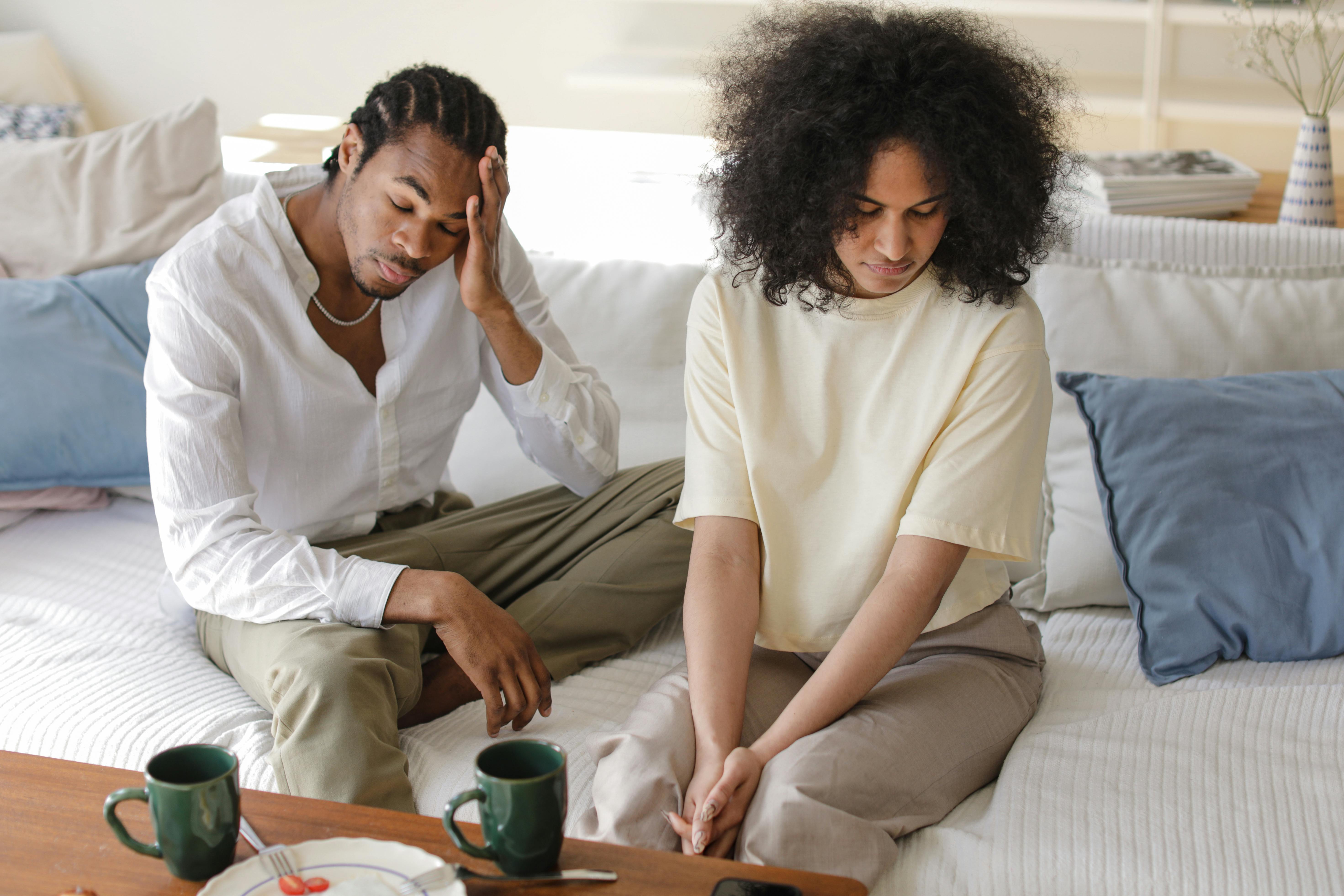 Couple sitting together in a quiet relationship moment