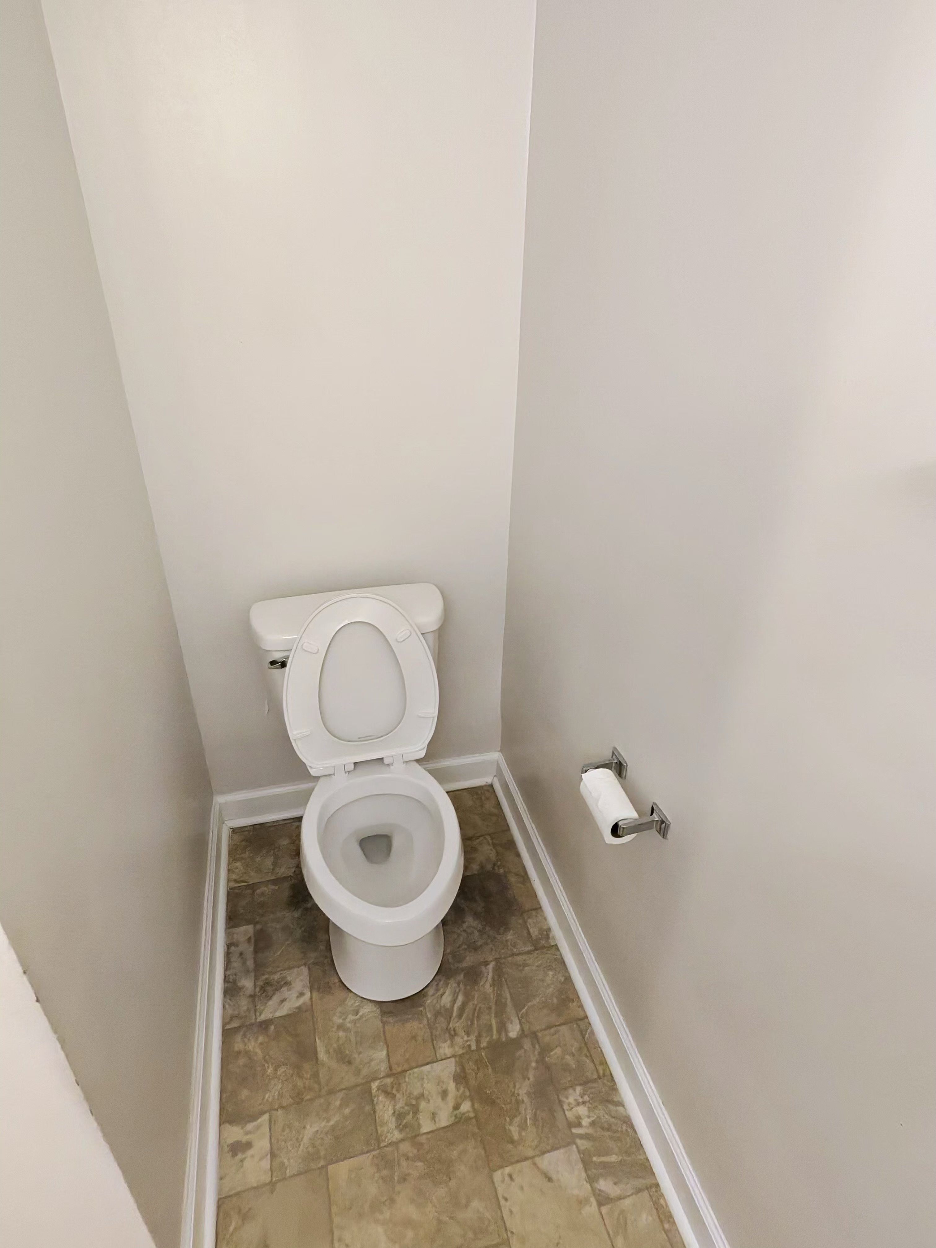 Cleaned bathroom with toilet and tile floor