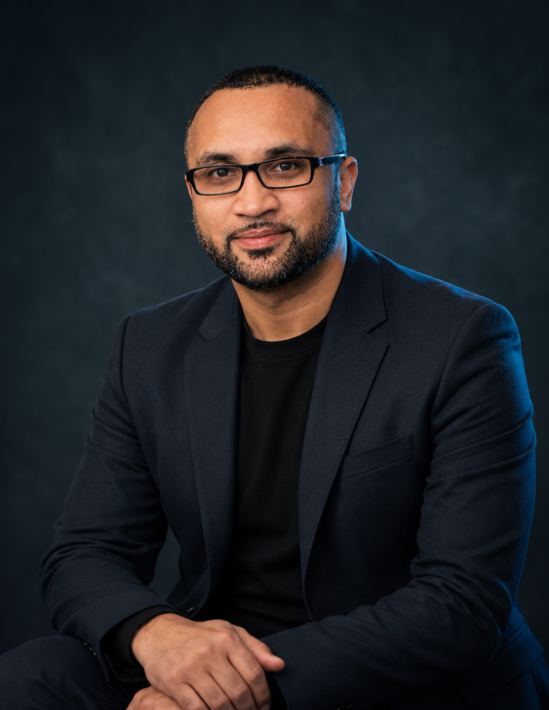 Belal Miah in a modern architectural studio discussing engineering strategy