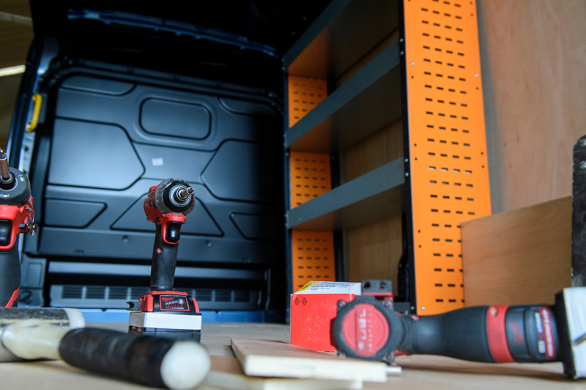 Heavy-duty metal racking installed in a van