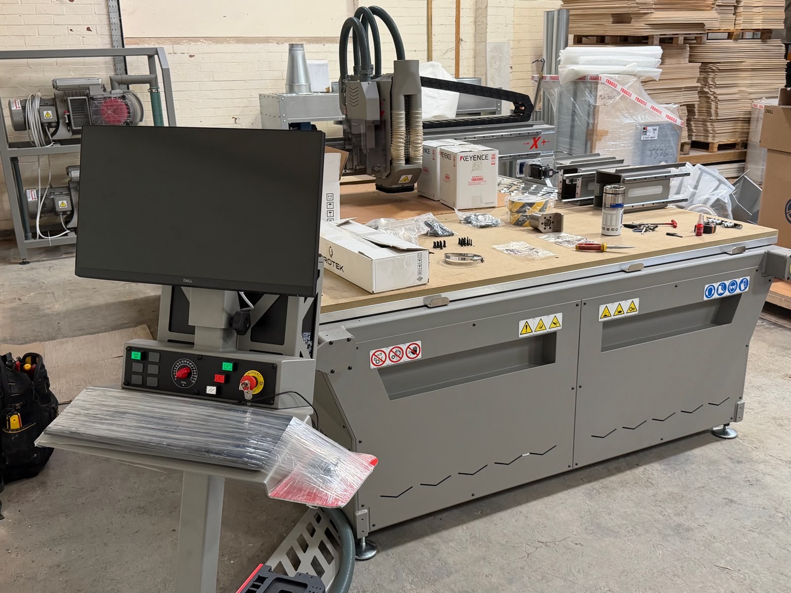 New Protek CNC machine cutting ply lining panels at the Unique Van Linings workshop