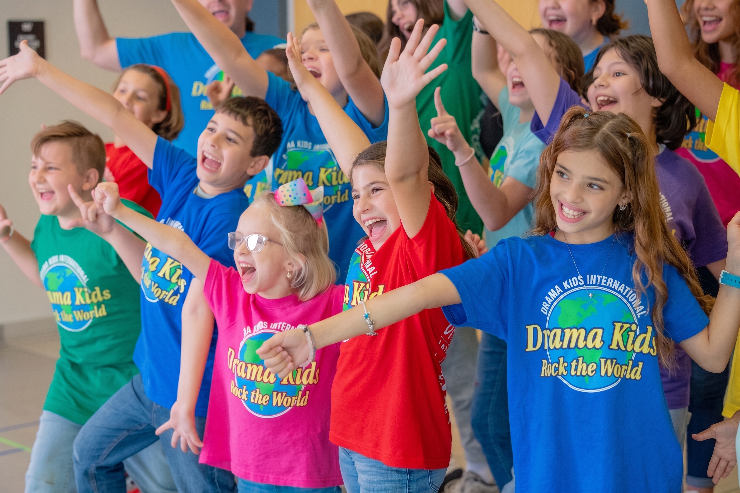 Children laughing and playing together in a Drama Kids class
