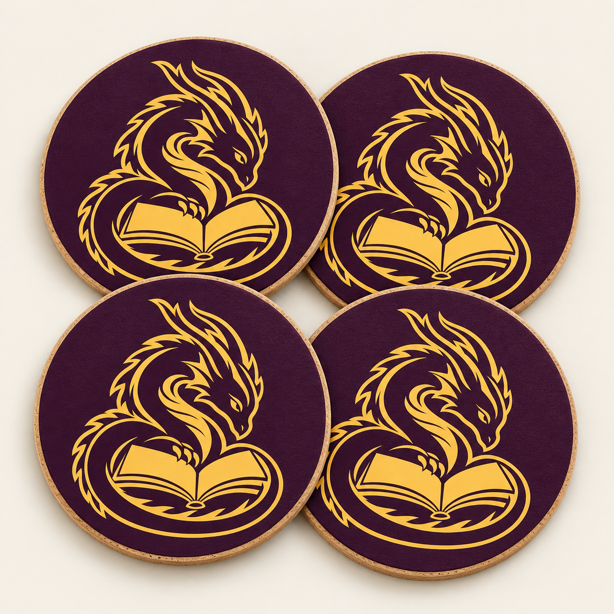 Four purple coaster concepts featuring the gold dragon-and-book emblem.