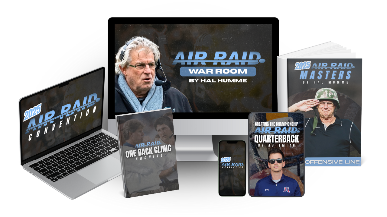 Coach Mills explaining a route concept in front of a film wall, documentary style portrait.