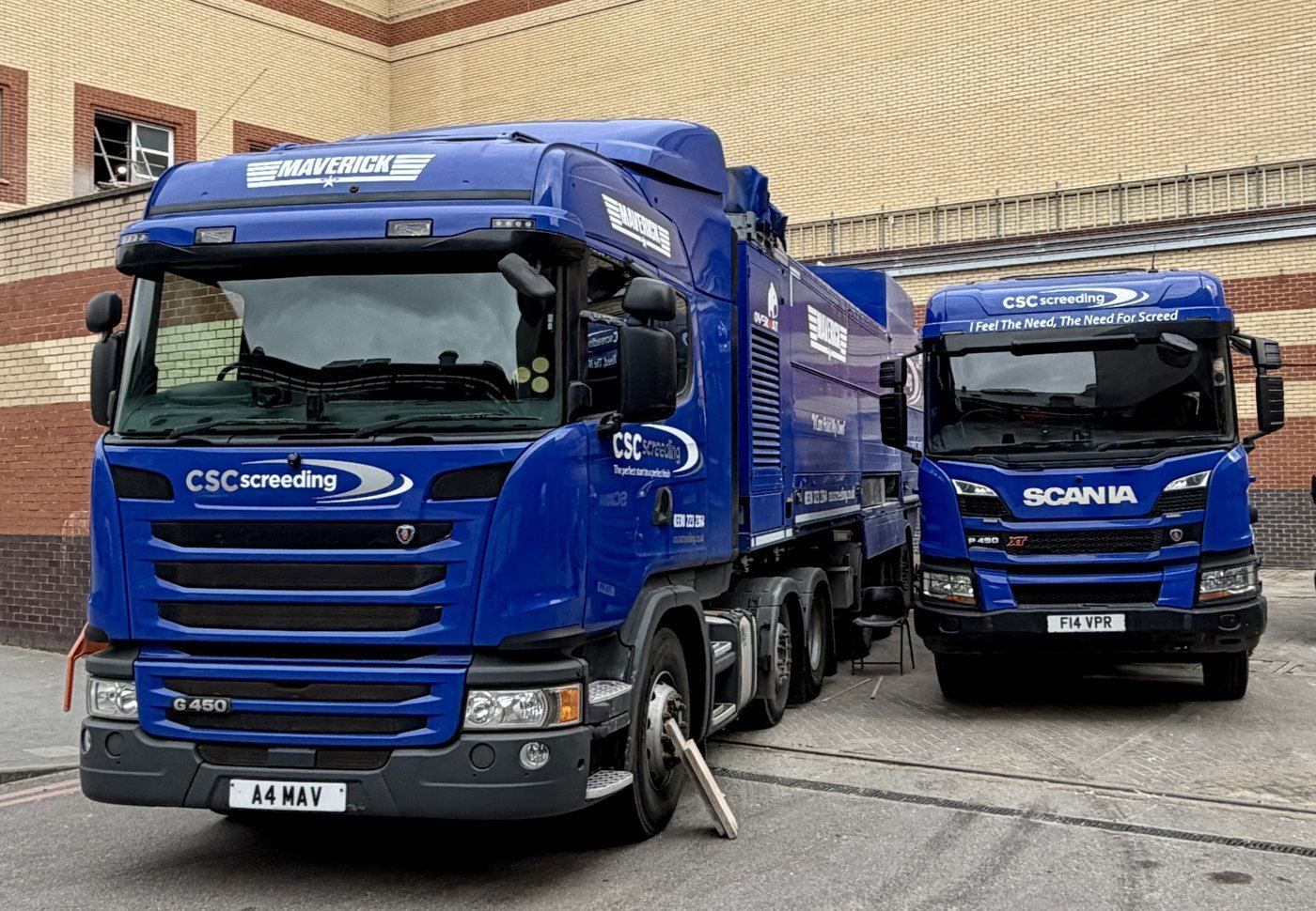 Two blue CSC Screeding Maverick trucks side by side in full livery