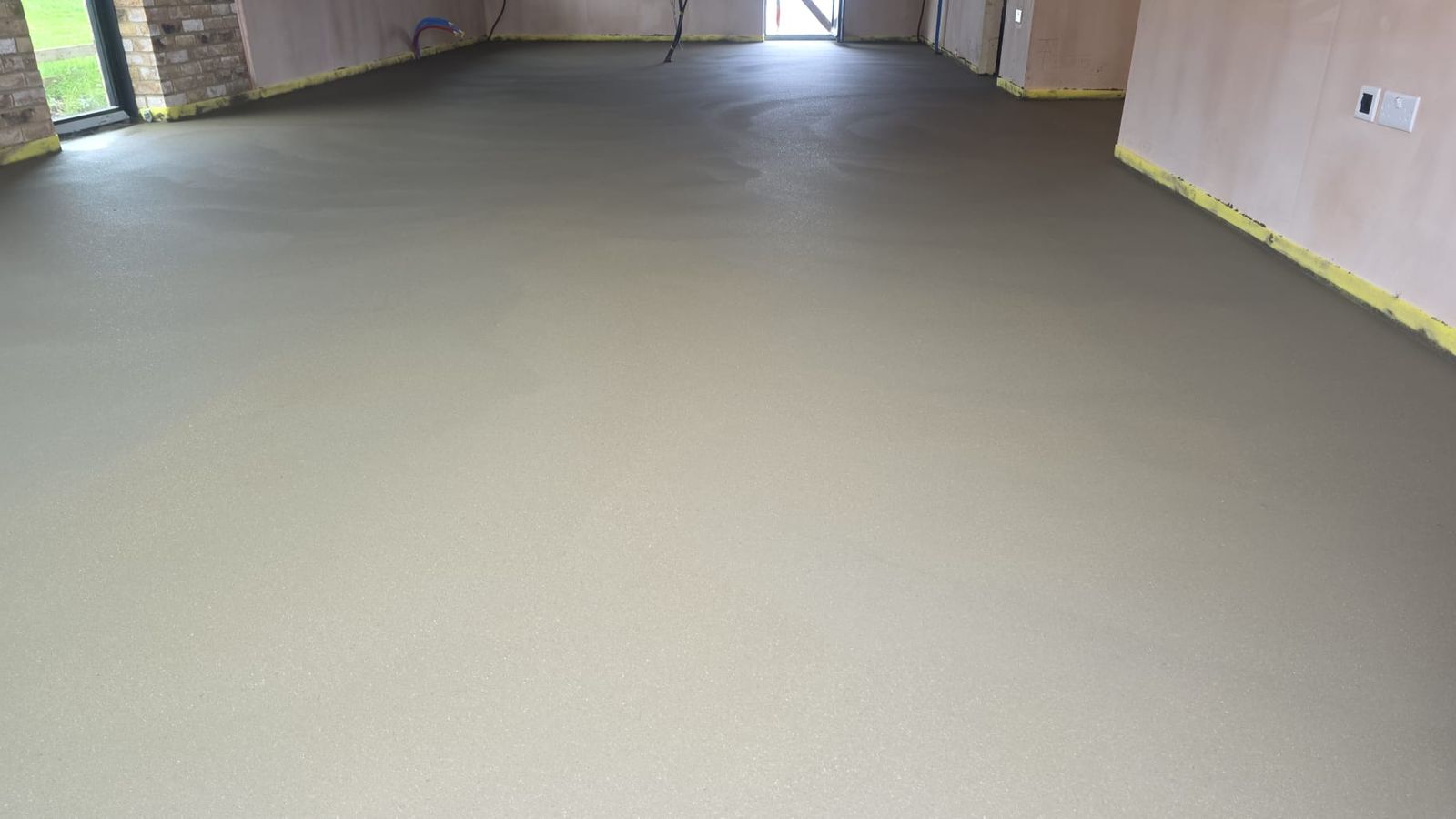A finished flowing screed floor in an apartment at Arundel Great Court