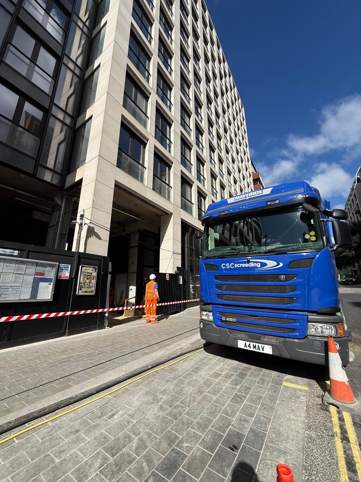 Front view of the blue CSC Maverick behind safety barriers at Arundel Great Court