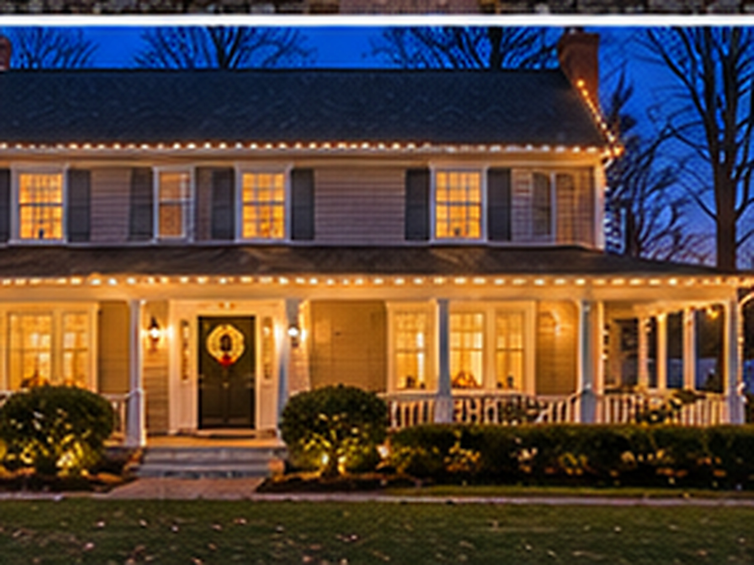 Home in Brookfield, CT lit with warm white Christmas lights