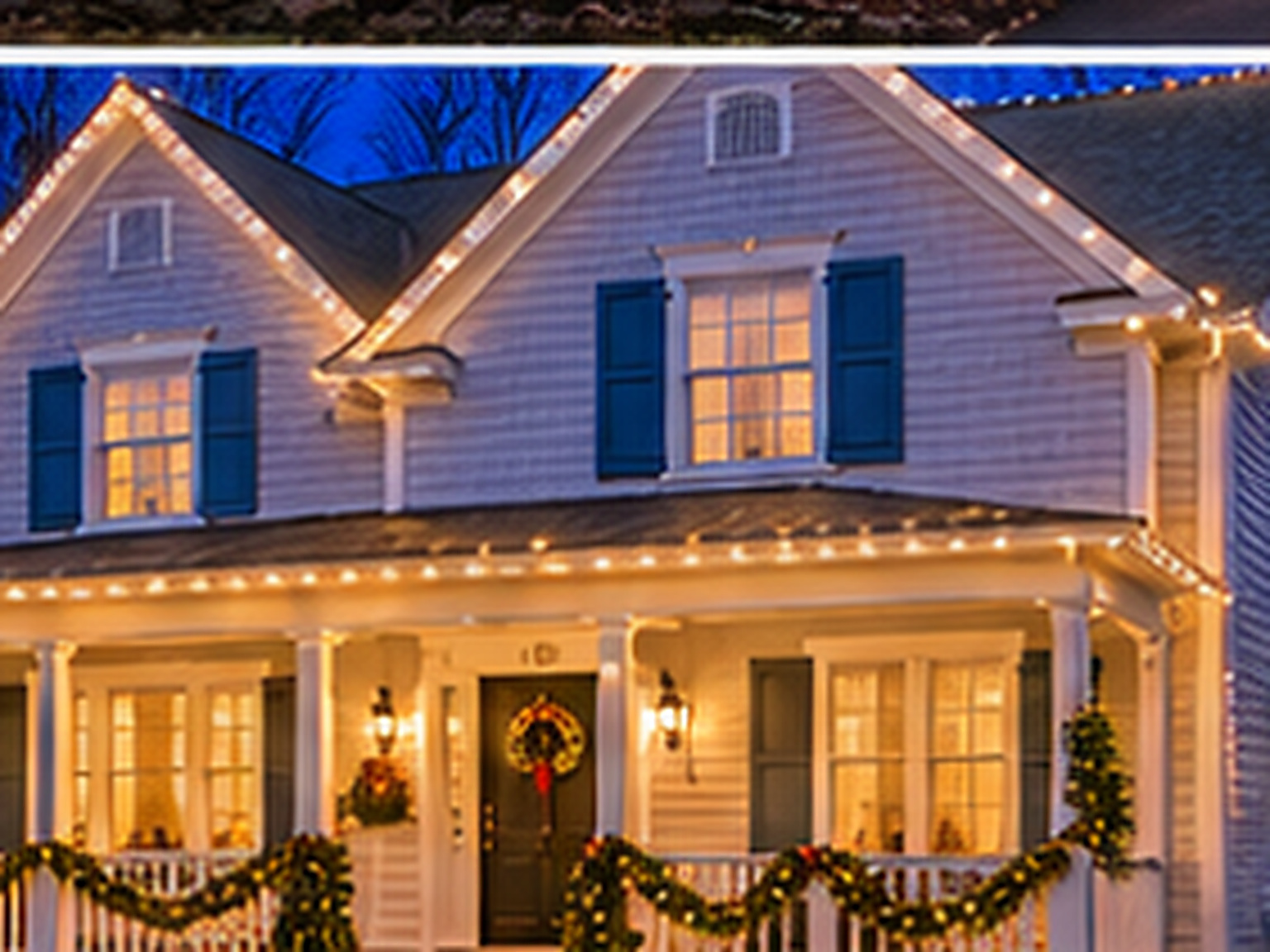 Home in Old Greenwich, CT lit with warm white Christmas lights