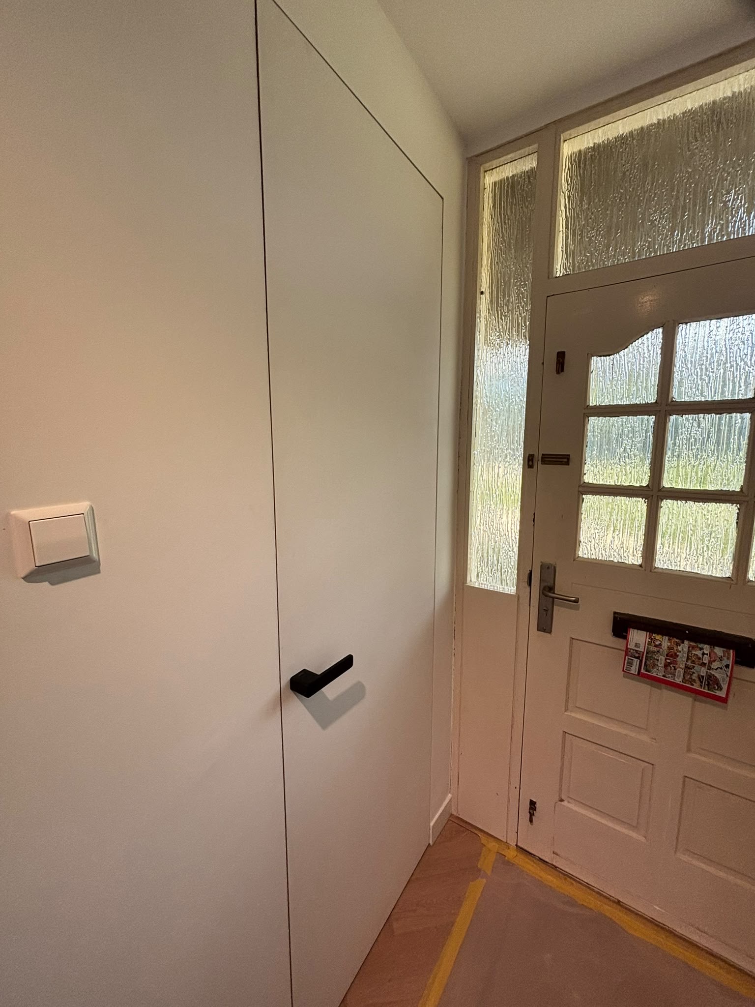 Toiletdeur afgewerkt als detailbeeld in Westervoort