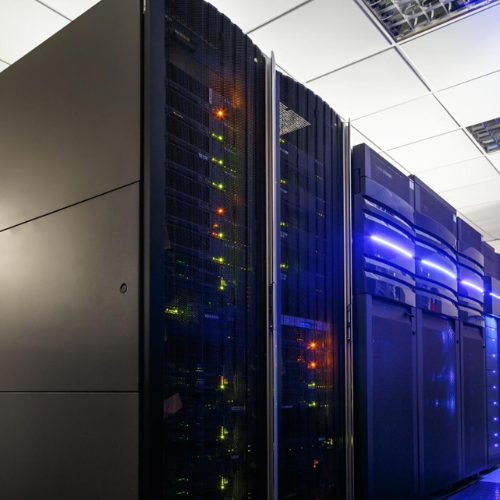 Network room with organized racks and cables