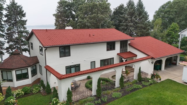 Home with a Unified Steel Barrel-Vault Tile roof
