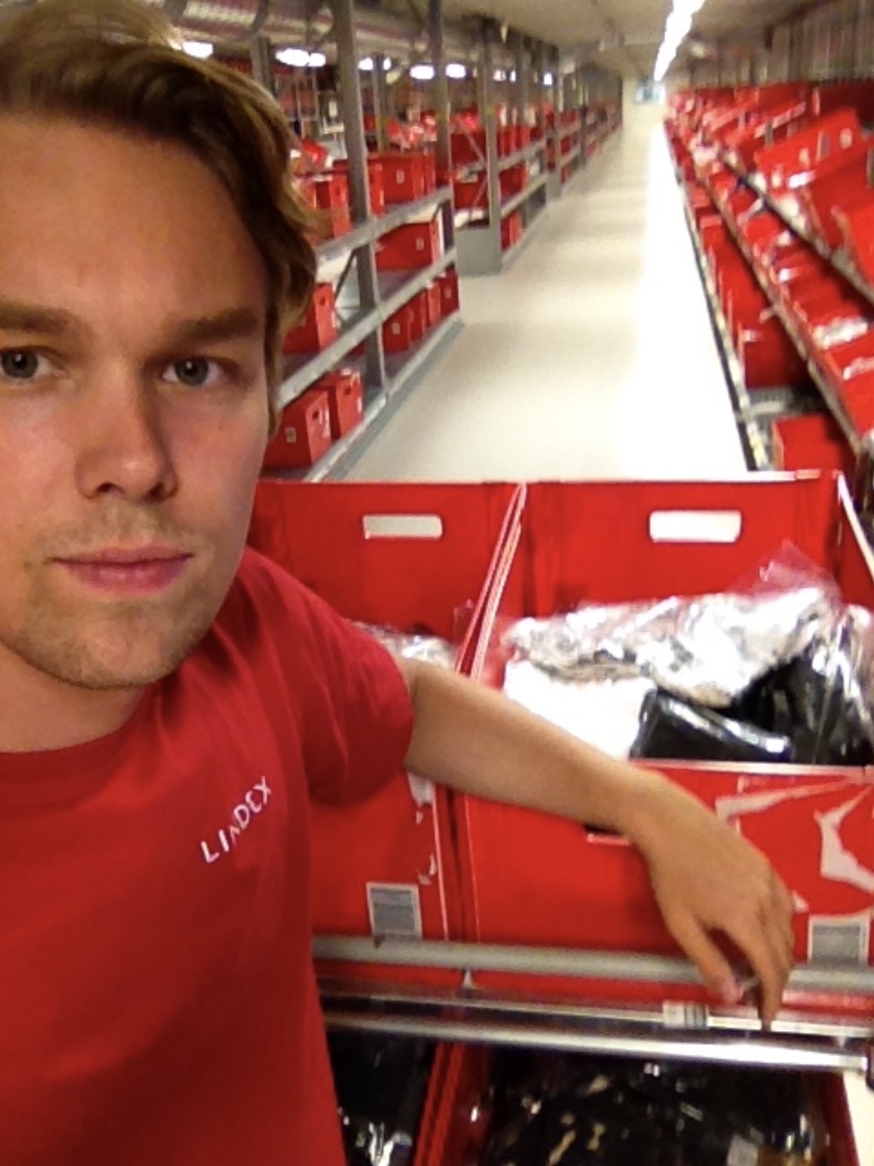 Max at his warehouse job in 2015