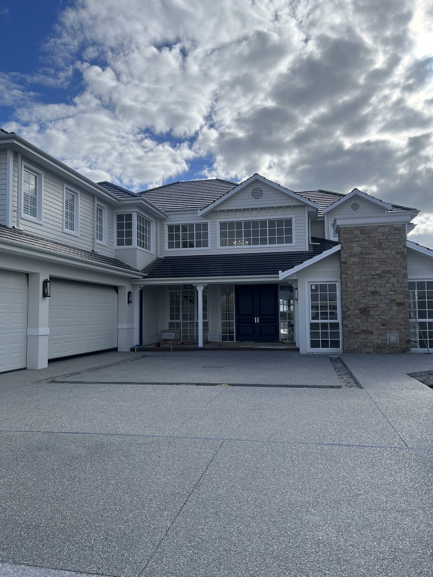 Two-storey residence with finished driveway